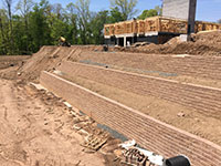 Terraced retaining wall construction Terraced retaining wall construction