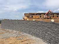 Retaining Walls with fences above at Brenda Cowan Elementary