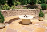Retaining wall and seating wall around fire pit Retaining wall and seating wall around fire pit