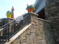 After Photo: Allan Block retaining wall with stairs After Photo: retaining wall with stairs